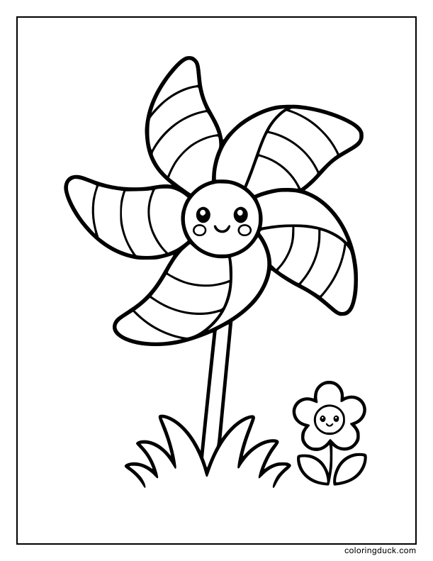 Spinning striped pinwheel stuck in the short grass.