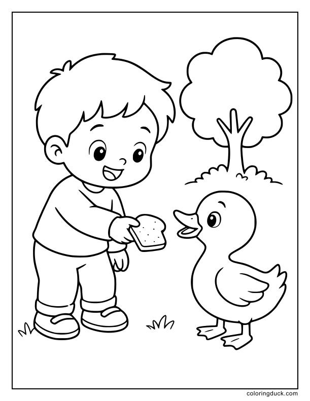 Smiling toddler offering a piece of bread to a friendly duck.
